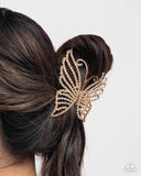 Paparazzi Floating Fanfare - Gold Hair Clip
