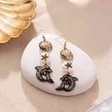 Paparazzi Delightful Dolphin - Gold Earring
